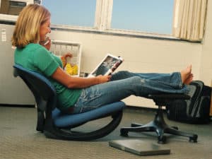 Trey being used as a floor rocker and foot stool