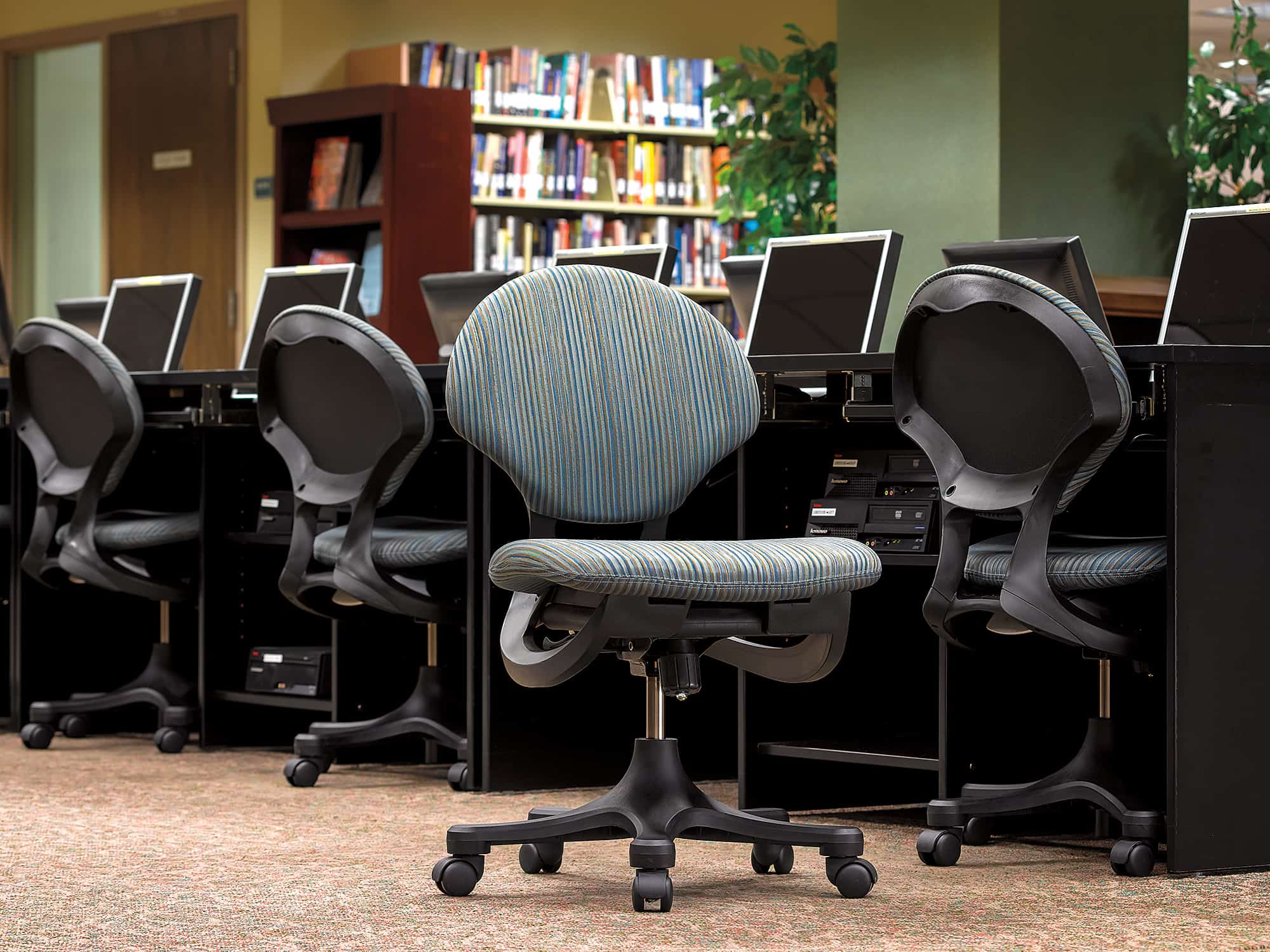 Trey, Multifunction Task Chair in a library