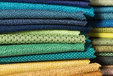 Various colors of fabric swatches, including yellow, green and blue
