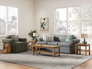 Student Suite or Apartment on Campus with Comfortable Couch and Chair with Wood Coffee and End Tables.