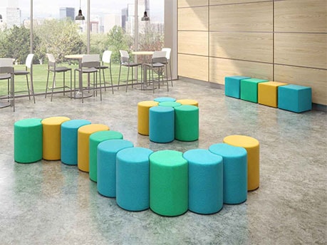 Kirby Stools/Ottomans in flower and line configuration on college campus study area