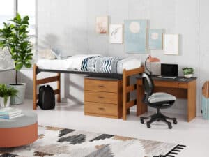 TruStak Bed in Dorm Room with Merit Writing Desk, Merit 3-Drawer Chest, Trey Chair, and Rally Round Ottoman from Sauder Education.